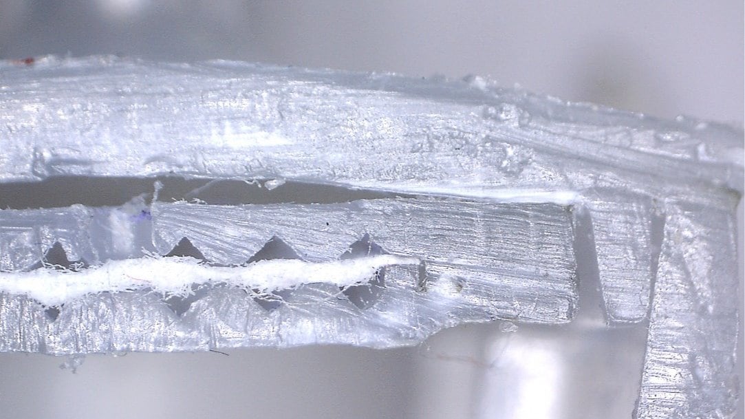 Cross section of welded filter unit with membrane